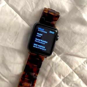 Apple Watch with two bands and charger